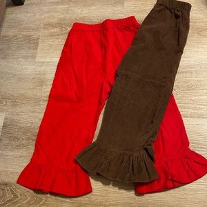 Girls size 4 corduroy pants in red and brown. Barely used.